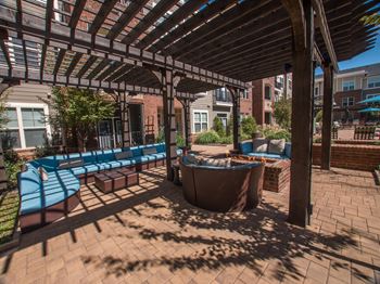 Outdoor lounge area with fire table